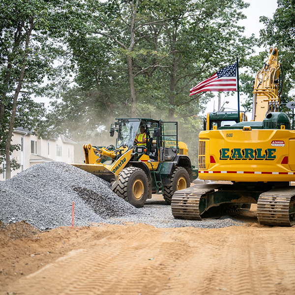 An Earle bulldozer pushes rock material on a New Jersey construction site.