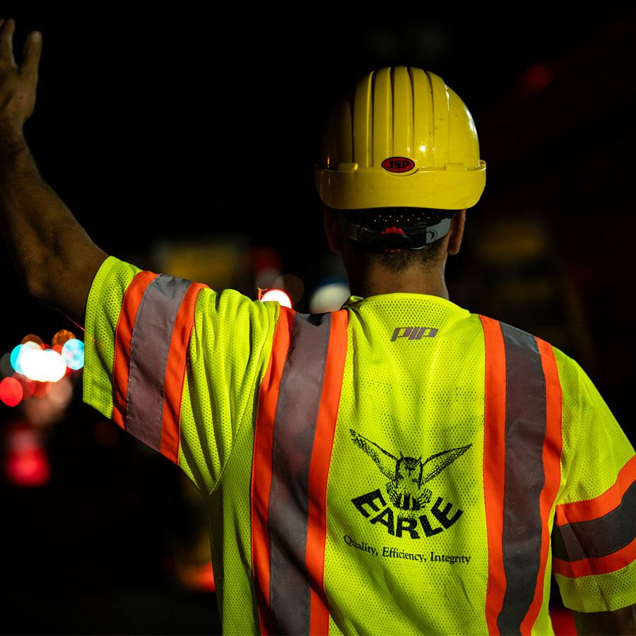 An Earle employee oversees a night time construction job in New Jersey.